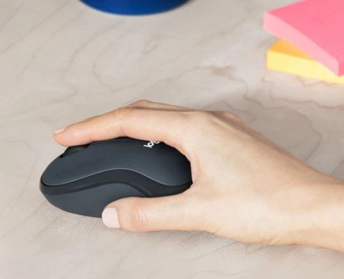 Logitech M221 Wireless Mouse Charcoal lifestyle view